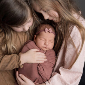 newborn and siblings